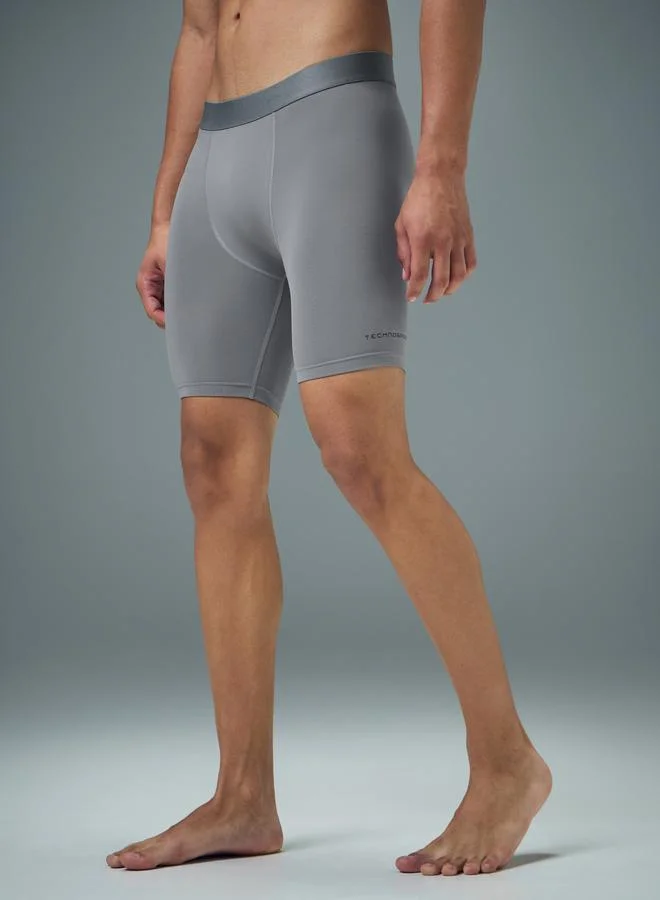 تكنوسبورت ليجن رياضي ضاغط رجالي سادة بقصة ضيقة